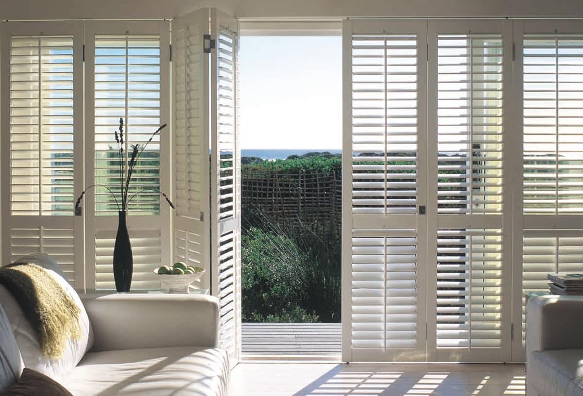 Bi-fold shutters for patio enabling seamless outdoor-indoor connection. Available at Shutterup Australia.