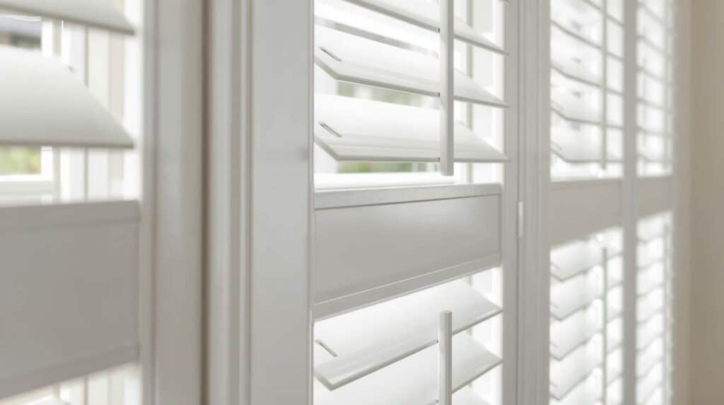 Premium shutter blinds with wide louvres offering light control in modern Brisbane interior