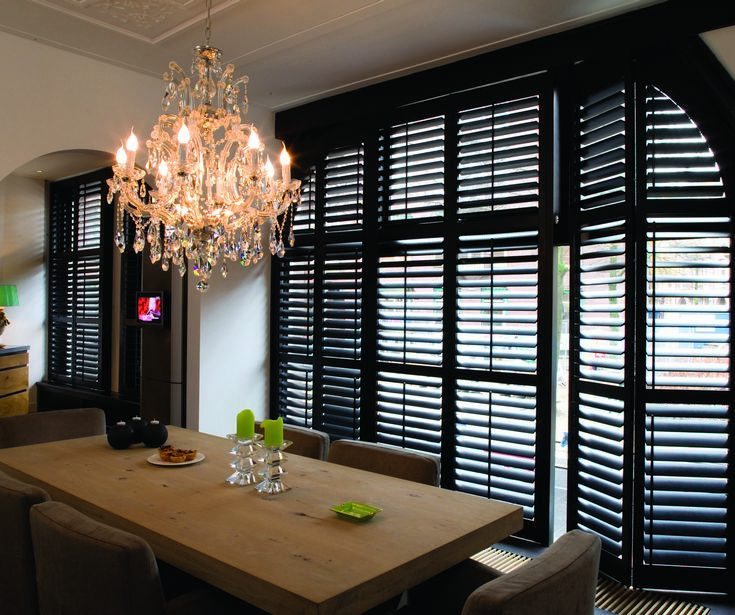 Timber plantation shutters Brisbane living room with natural light control