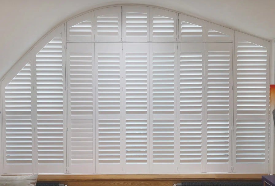 Norman Brightwood hybrid plantation shutters combining hardwood panels with engineered frames for Brisbane homes