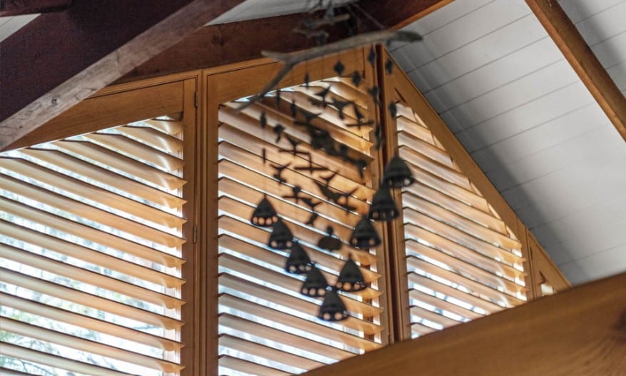 Norman Normandy hardwood plantation shutters installed in traditional Brisbane Queenslander home with stained timber finish