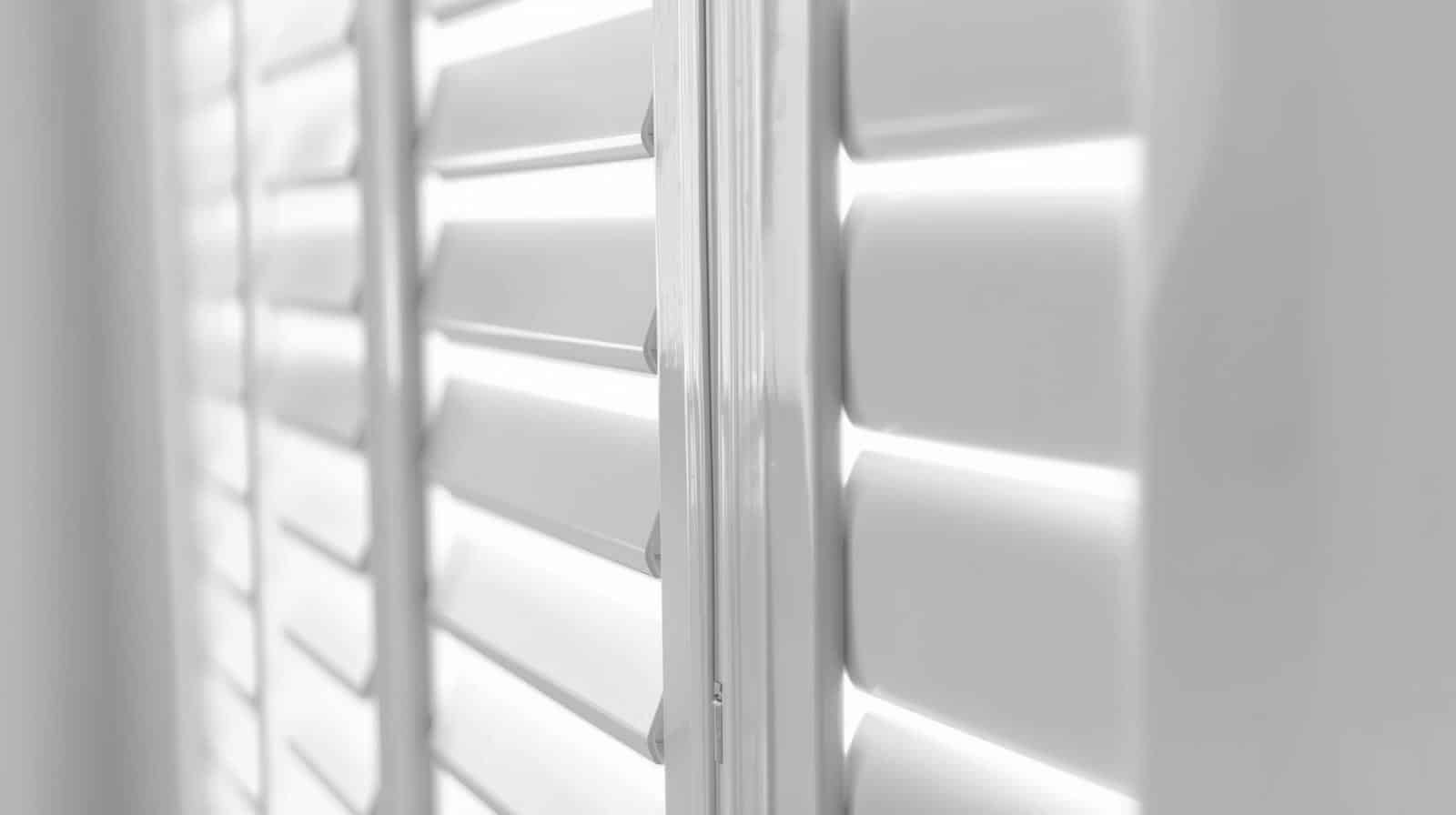 White PVC shutters in Brisbane bathroom demonstrating moisture resistance and durability in high humidity