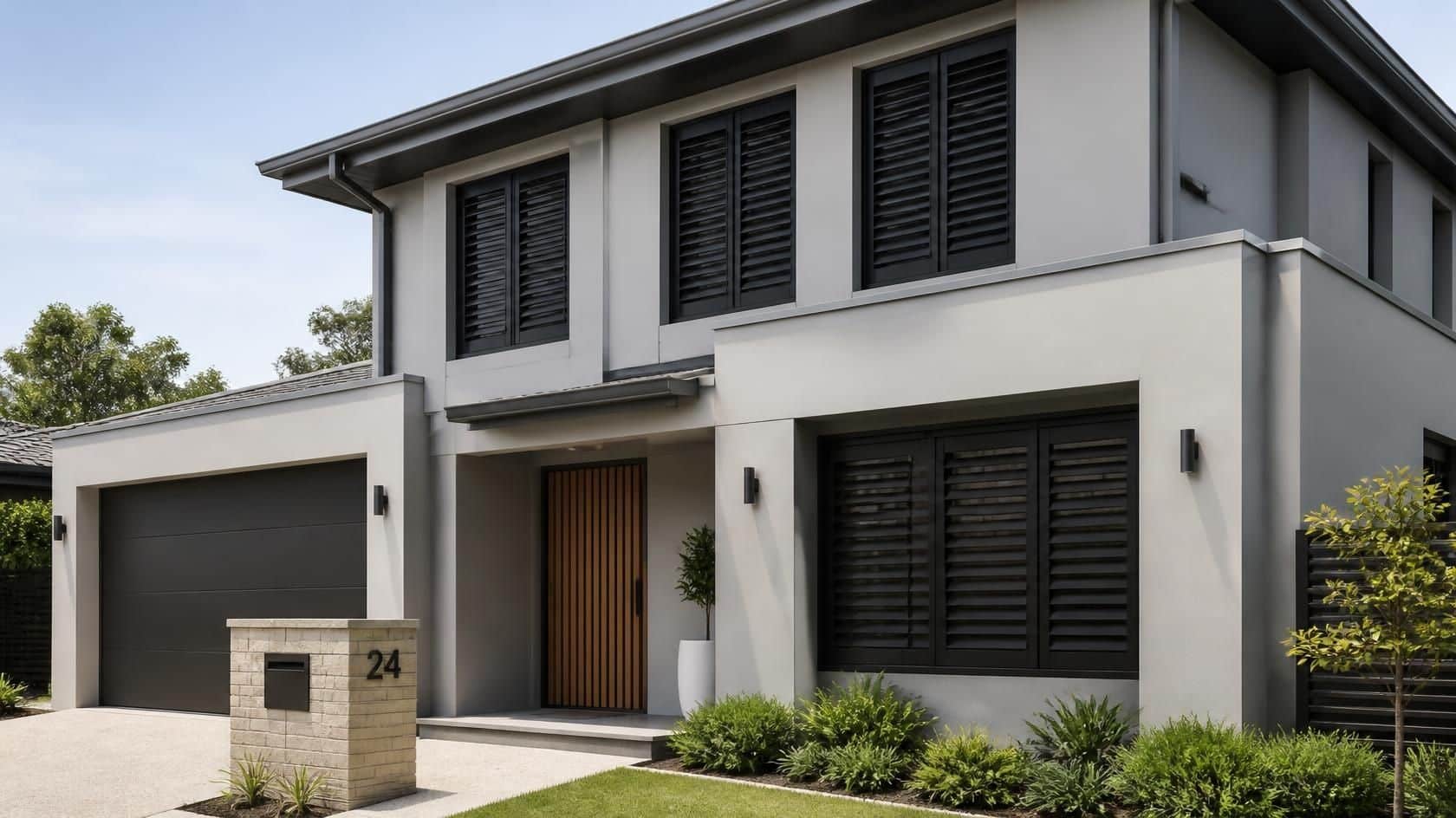 Modern Brisbane home with charcoal aluminium plantation shutters